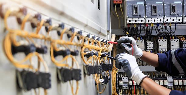 Professional Electrical Panel Upgrade technician working in Cerro Gordo County County, IA